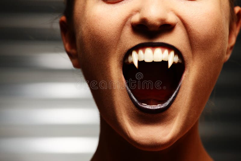Close up of a vampire woman's mouth