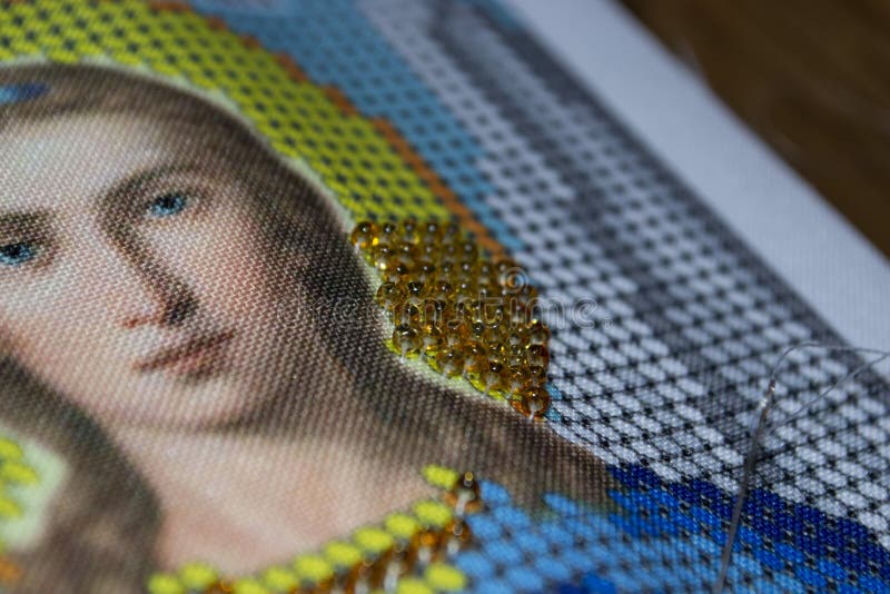 Close-up van beadwork van het pictogram van Jesus Christ op een zachte vage achtergrond Handwork stock foto's Close-up van beadwork van het pictogram van Jesus Christ op een zachte vage achtergrond Handwork stock foto's