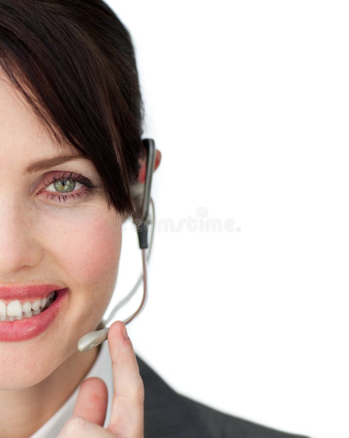 Close-up of an attractive customer service agent against a white background. Close-up of an attractive customer service agent against a white background