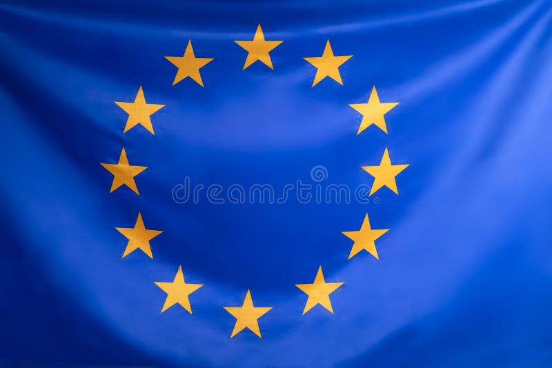 Close-up Of European Union Flag With Circular Yellow Stars. Close-up Of European Union Flag With Circular Yellow Stars