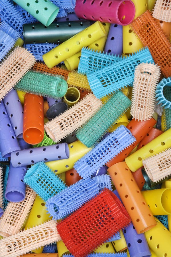 Close-up of pile of hair curlers. Close-up of pile of hair curlers.