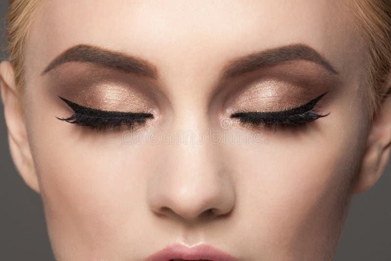 Close-up van oogmake-up stock afbeeldingen Close-up van oogmake-up stock afbeeldingen