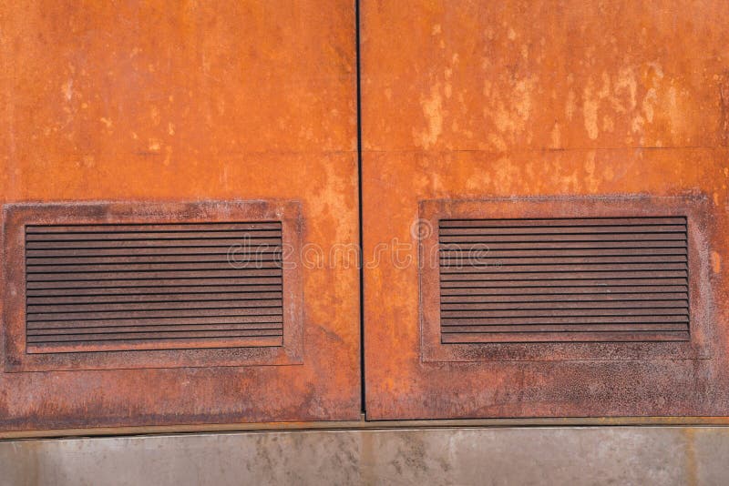 Close-up of ventilation in a rusty iron door royalty free stock photo