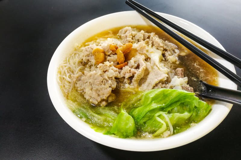 Close-up on Vermicelli pork noodle soup popular in Penang Malays stock photo Close-up on Vermicelli pork noodle soup popular in Penang Malays stock photo