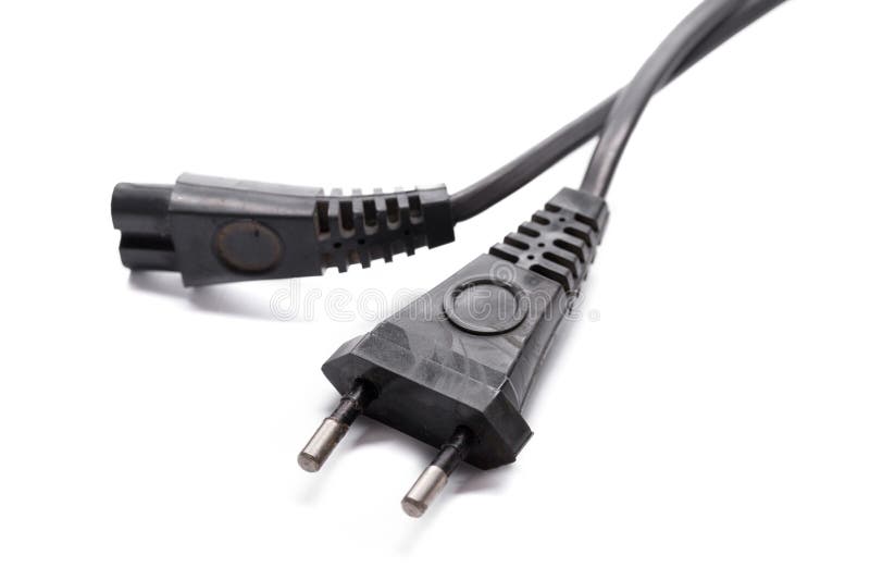 Black electrical plug and cable with two prongs on a white background royalty free stock photography