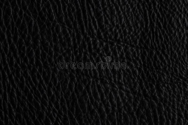 Close up view of black leather surface showing texture and design details in natural light during daytime stock photos