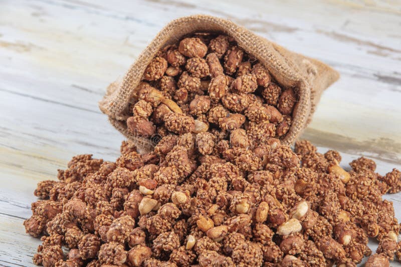 Closeup View of Brown Colored Peanuts and Peanut Collection. Concept