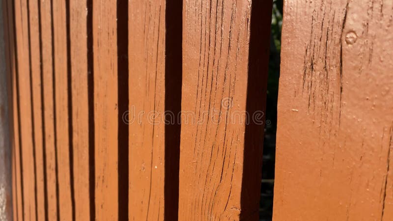 Close-up view of brown wooden fence. Natural background