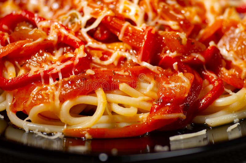 Close-up view of a dish of Italian spaghetti with vegetables and cheese. Italian pasta spaghett stock images, royalty-free photos and pictures