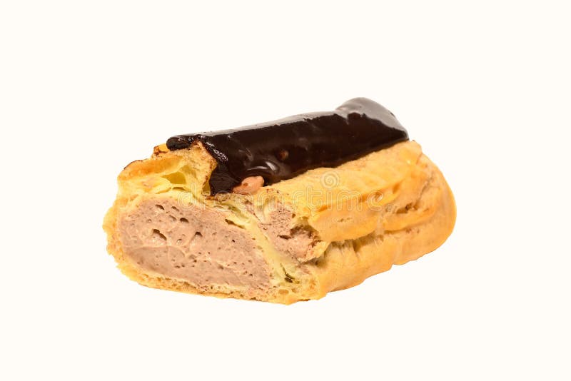 Close up view of eclair with cream. Cut in half filled profiterole with chocolate cream. royalty free stock images Close up view of eclair with cream. Cut in half filled profiterole with chocolate cream. royalty free stock images