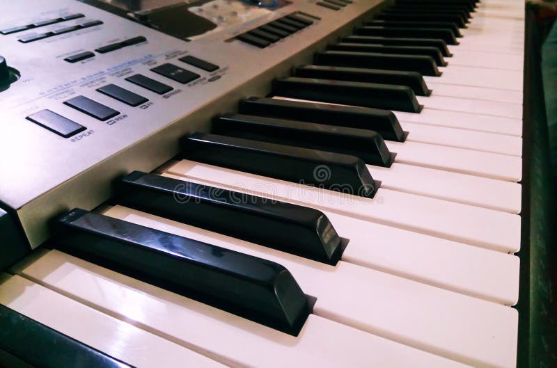 Close up shot of electronic piano synthesizer Keyboard. selective focus and side angle view