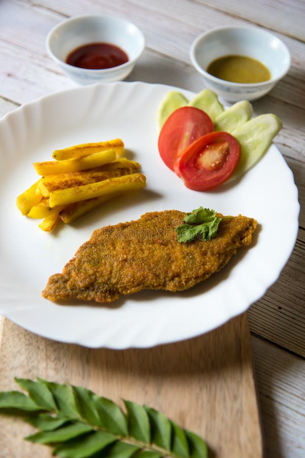 Close Up View of Fish and Chips with Salad Stock Image Image of