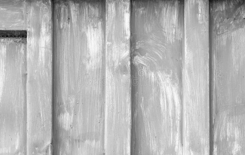 Close-up view of gray painted metal surface, showcasing visible brushstrokes and texture. Perfect for design projects or as a background. Retro grayscale paint stock images, royalty-free photos and pictures