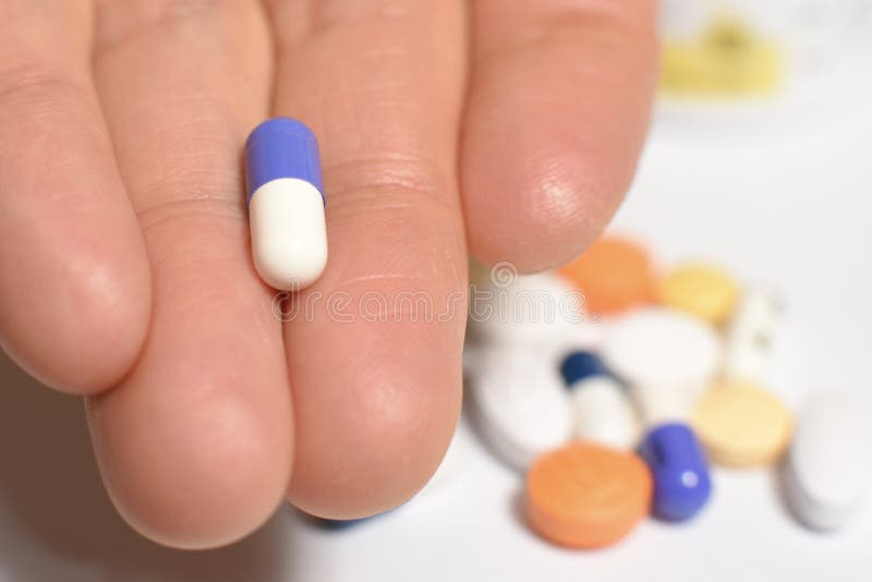 Medical pills and capsules stock photo