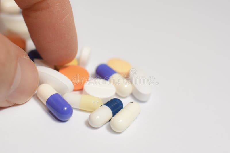 Medical pills and capsules stock images