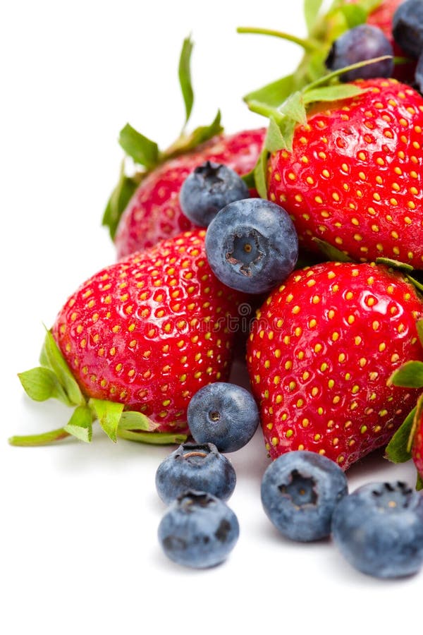 Close up view of heap of strawberry and bilberry stock photography