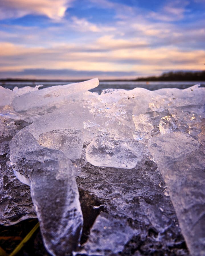 Natural Blocks of Ice Breaking Against Water and Land during Frosty ...
