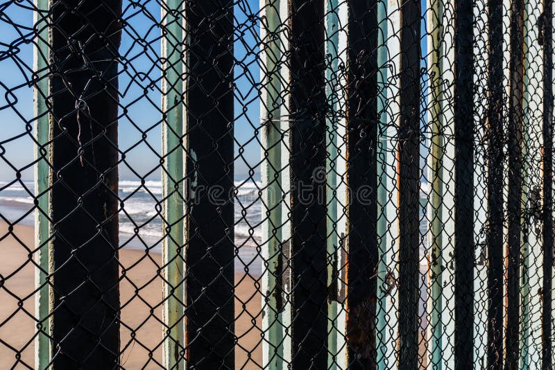 Close-Up View of International Border Fence With Tijuana Beach