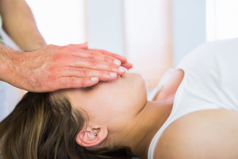 Close up view of relaxed pregnant woman getting reiki treatment royalty free stock image Close up view of relaxed pregnant woman getting reiki treatment royalty free stock image