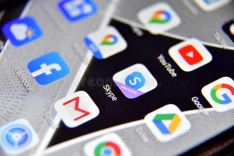 Close-up view of Skype icon app on an Android smartphone, including other icons royalty free stock images