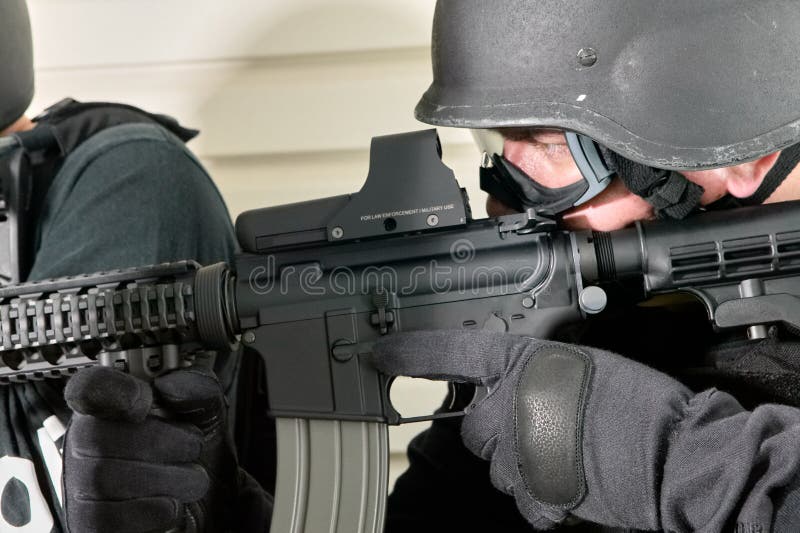 Close up view of special force soldier with rifle stock photography