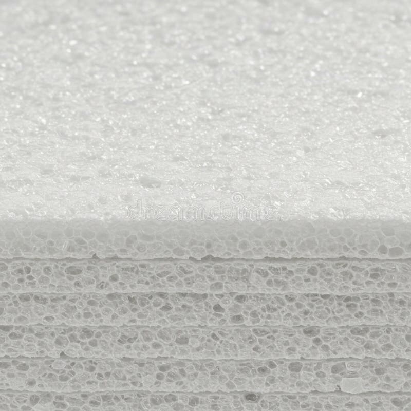 Close-up view of a stack of white polystyrene foam sheets. The image showcases vector illustration