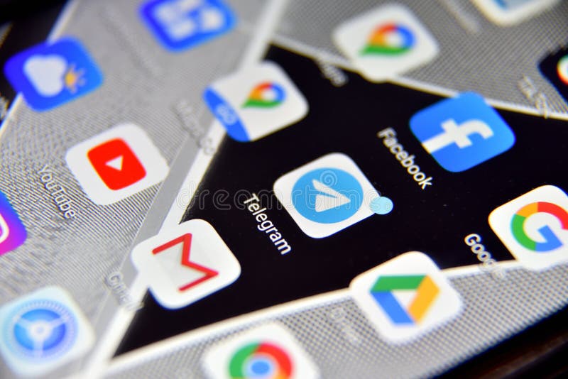 Close-up view of Telegram icon app on an Android smartphone, including other icons stock photos