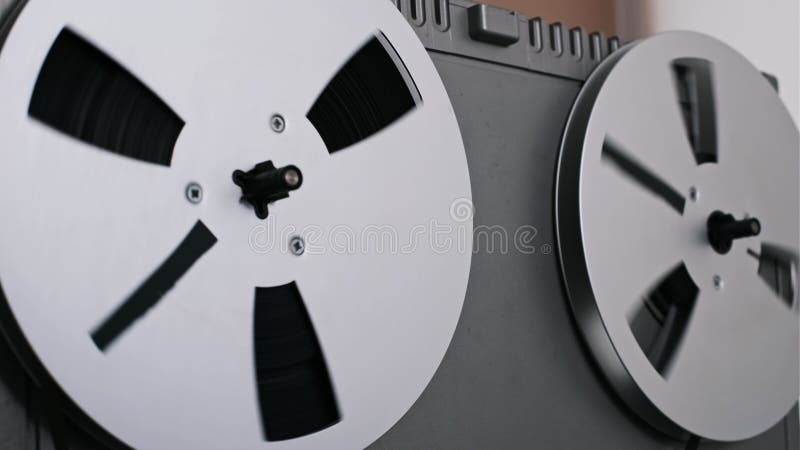 Vintage Reel-to-Reel Tape Player with Rotating Spools stock video