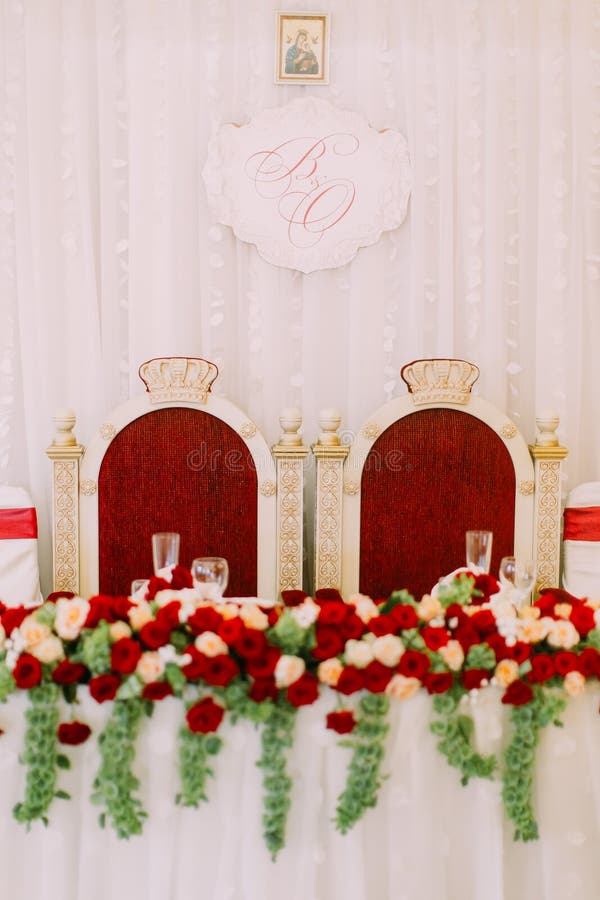 Closeup View of the Wedding Table Set for Newlywed Couple Decorated