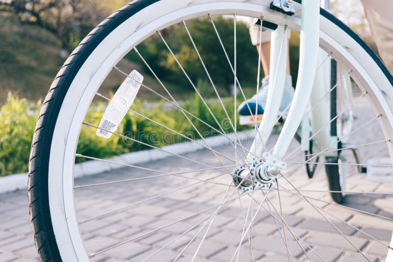 Close-up of vintage Bicycle wheels with white tires and reflector stock image Close-up of vintage Bicycle wheels with white tires and reflector stock image