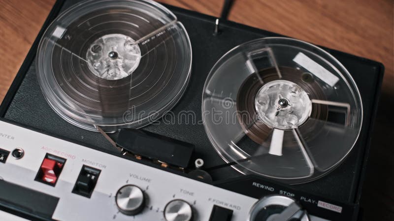 Vintage reel-to-reel tape recorder in action stock footage