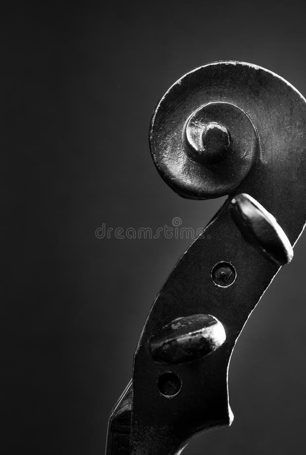 Close Up of Violin Scroll and Bow royalty free stock photos