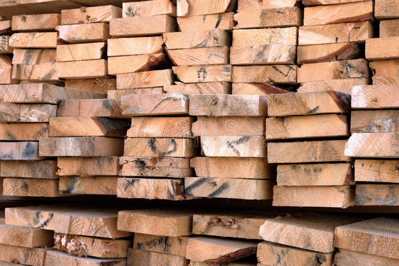 Closeup of a Warehouse of Wooden Boards of Various Sizes for