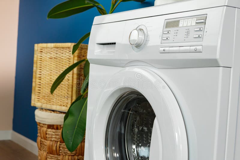 Close Up of Washing Machine in Bathroom. Stock Photo Image of