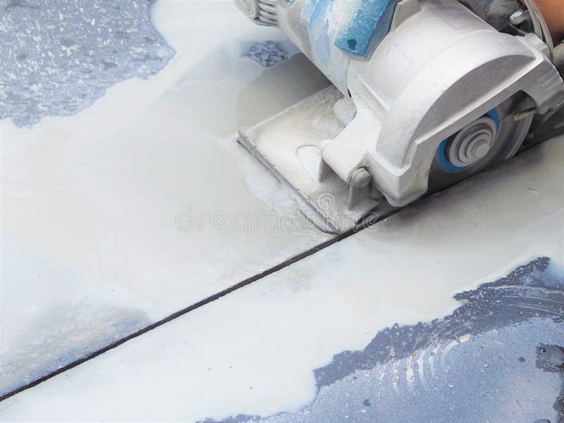 Close up wet sawing machine for cutting marble stone stock photos