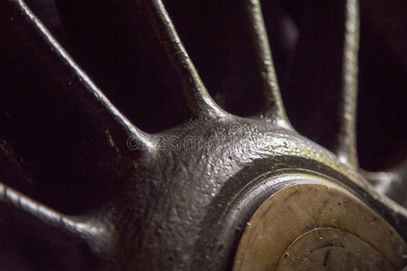 Close up of wheel of old steam locomotive