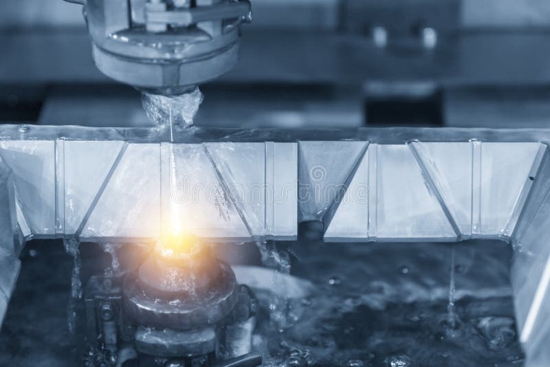 Close-up of the wire - EDM CNC machine stock photo Close-up of the wire - EDM CNC machine stock photo
