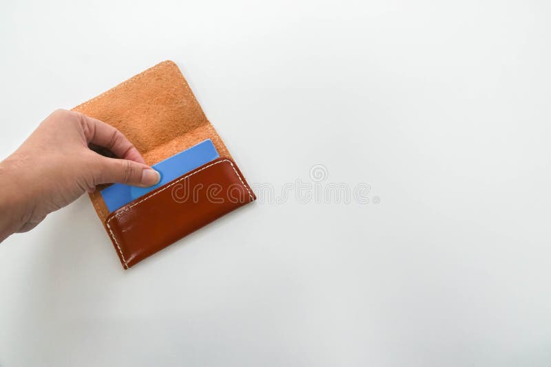 Close up woman with business name card in leather pocket holder stock photography Close up woman with business name card in leather pocket holder stock photography