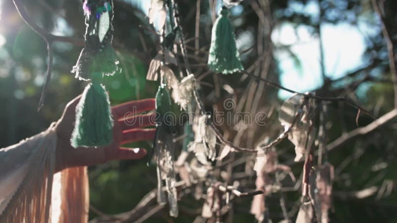 Close up of woman hand touching boho accessories outdoors stock video footage