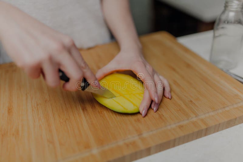 Woman Cutting Mango Fruit with Sharp Knife Stock Image Image of
