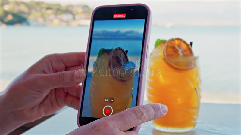 Close up of a woman's hand filming an or stock footage
