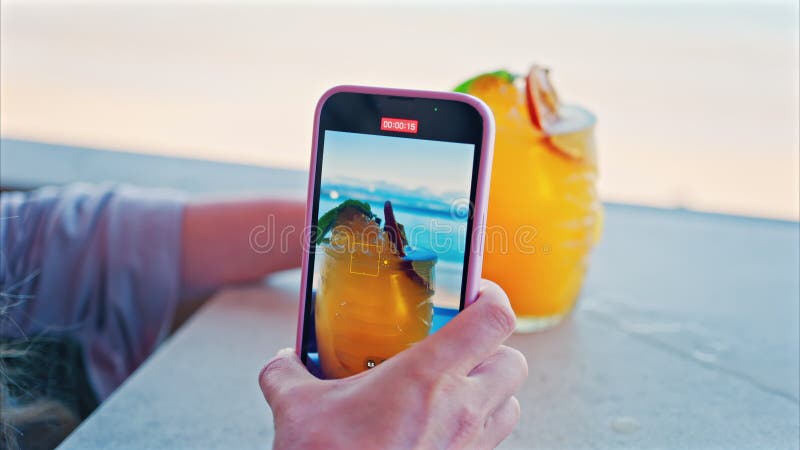 Close up of a woman's hand filming an or stock footage