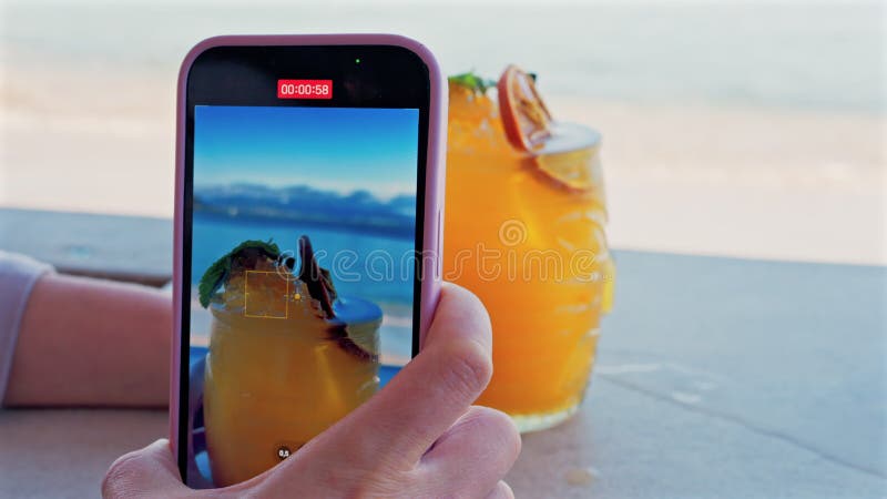 Close up of a woman's hand filming an or stock video