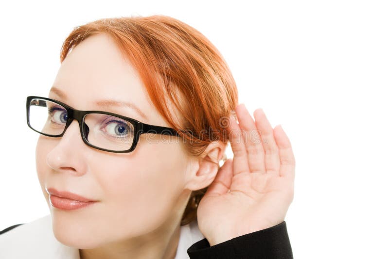 Close up of woman s hand to his ear .