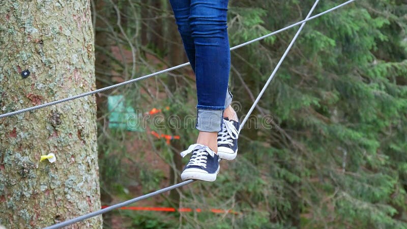 Close-up of the legs when balancing on the rope