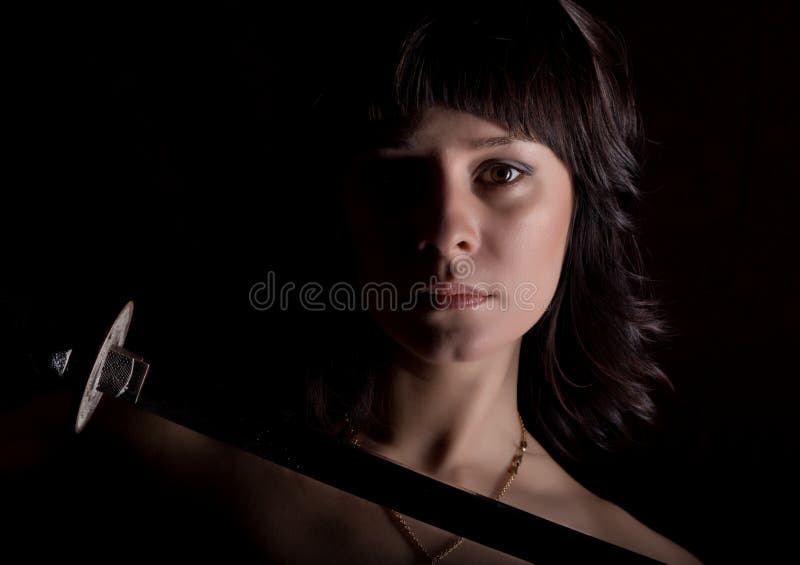 Dark nude warrior woman