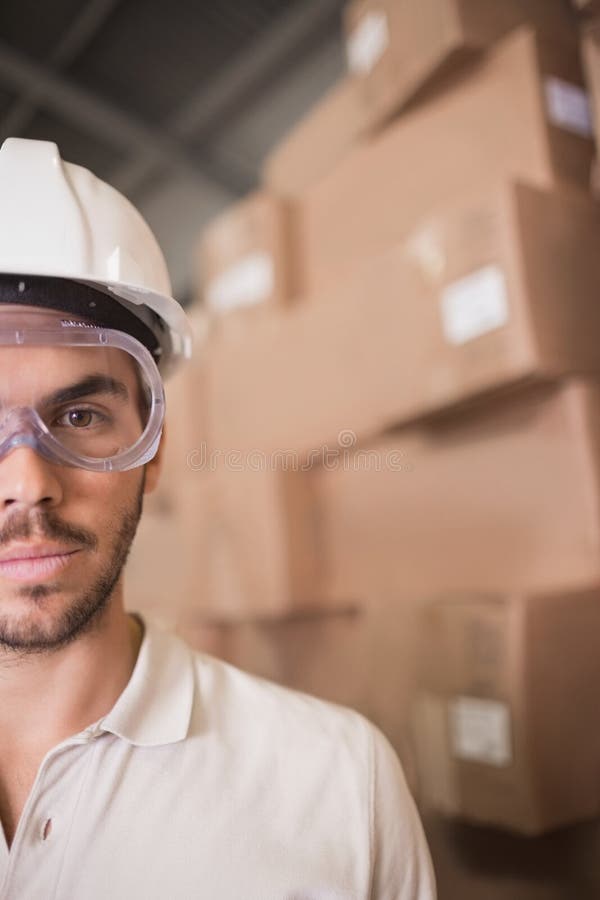 Close Up of Worker Wearing Hard Hat in Warehouse Stock Photo Image of