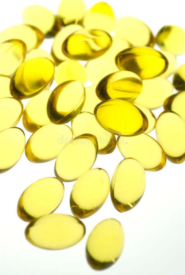 Close Up of Yellow Gel Capsules. Stock Image Image of fishy, gamma