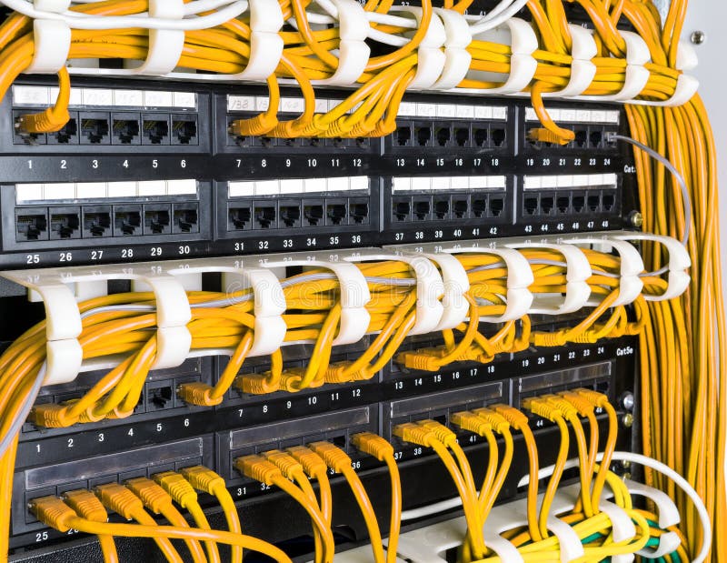 Close up of yellow network cables connected to switch royalty free stock photos