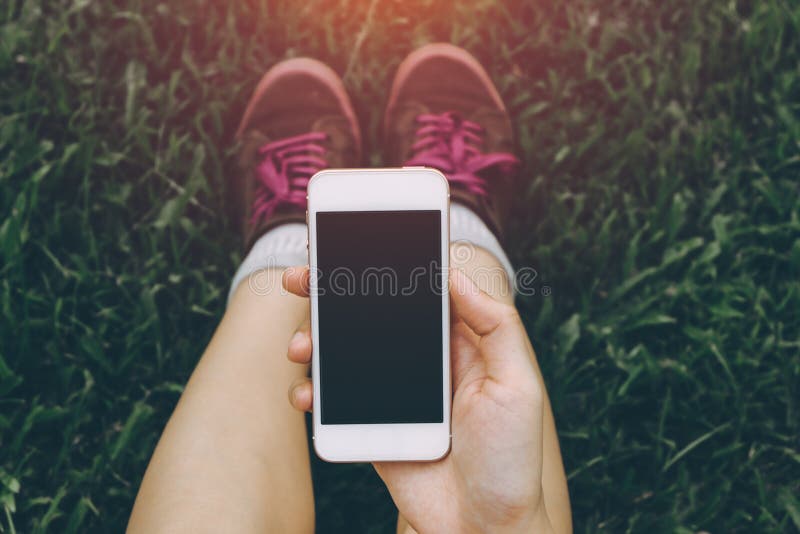 Close up of young asian healthy women`s hands holding cell telephone. royalty free stock photos Close up of young asian healthy women`s hands holding cell telephone. royalty free stock photos
